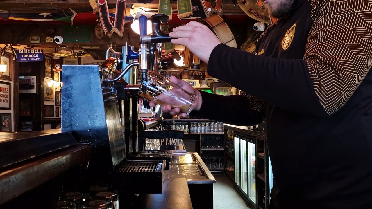 Pouring a pint of Guinness