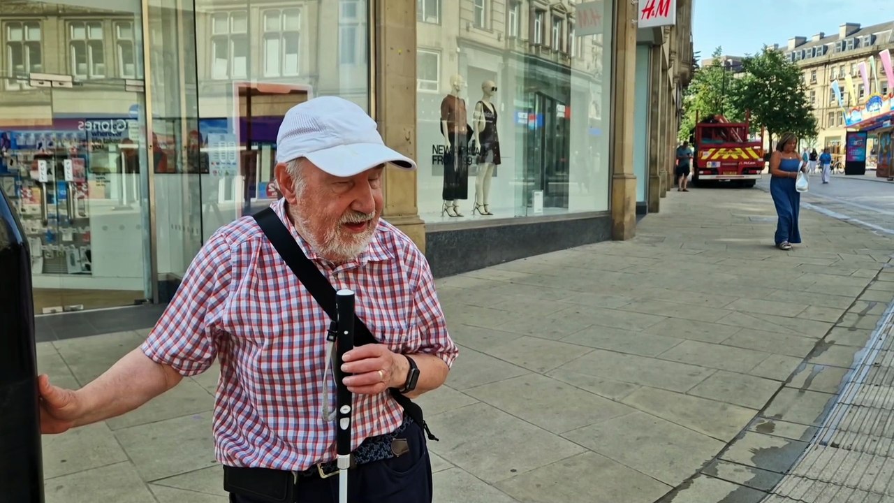 Sheffield's Fargate renovations are not blind friendly - the textured paths lead walkers into sign posts