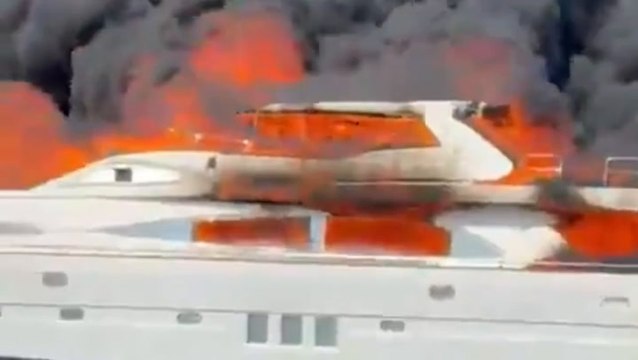 Watch as huge superyacht engulfed in flames off Ibiza coast
