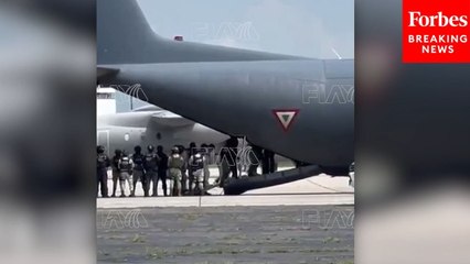 Cartel Members Board Plane Following Extradition Deal Between Mexico And U.S.
