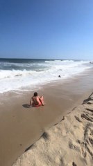 Man Falls While Attempting Backflip on Beach