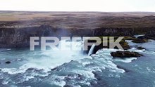 powerful godafoss waterfall in northern iceland - aerial drone shot