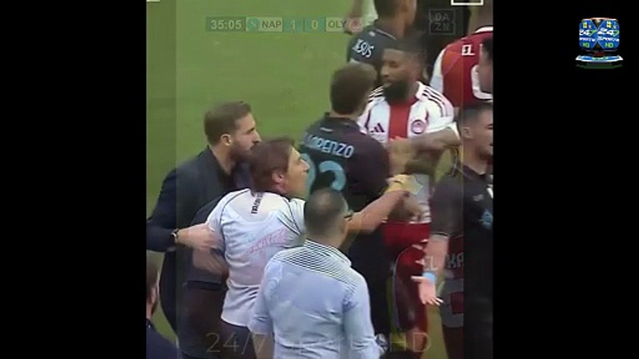 Ex-Chelsea boss Antonio Conte storms onto the pitch and is restrained by the fourth official