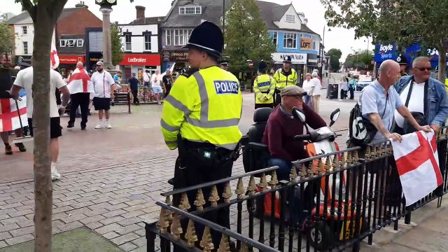 Anti-immigration protesters and anti-racism counter-protesters gather in Cannock