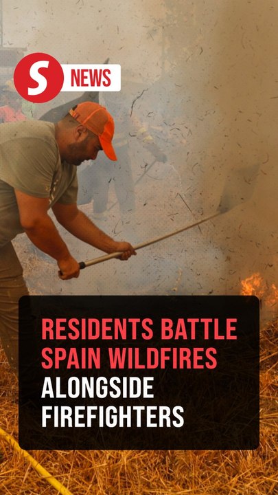 Residents battle wildfires alongside firefighters in Spain