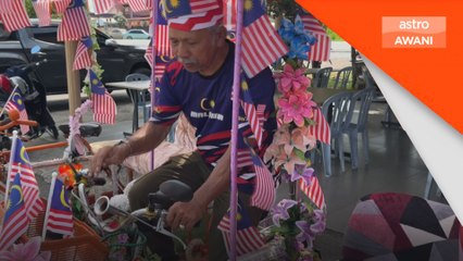 Pesara tentera hias beca dengan Jalur Gemilang