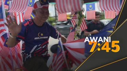 Pesara tentera hias beca dengan Jalur Gemilang