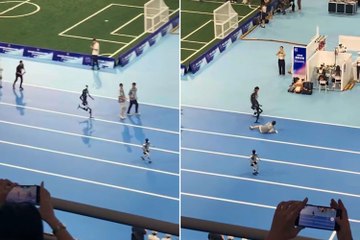 Robot runs into man during humanoid games
