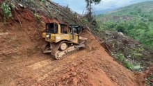 Bulldozer D6R XL Creates a Path in Extreme Mountain Slope Terrain