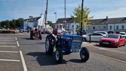 Tractors on the annual Bradley's Corner tractor run pull into Draperstown