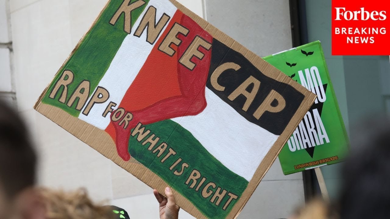 Protesters Gather To Support Rap Group Kneecap As Frontman Faces Charges For Flying Hezbollah Flag