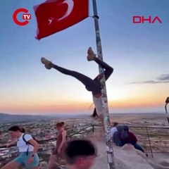 Kapadokya'da bayrak direğinde dans: Turist hakkında soruşturma başlatıldı