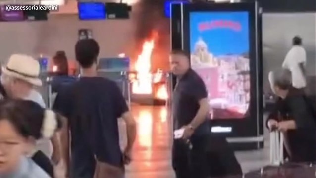 Passengers flee after man ‘sets fire to Milan airport check-in desk’