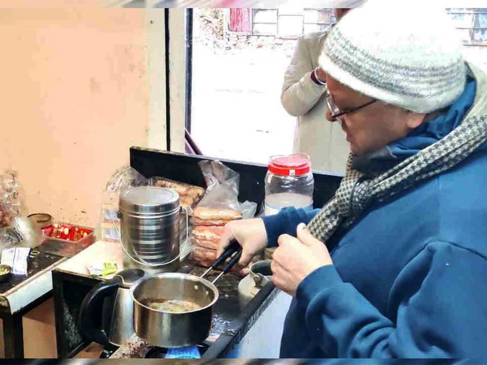 India: Uttarakhand CM Dhami makes tea at a stall during a walk