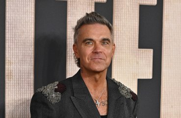 Robbie Williams eager to open for Oasis