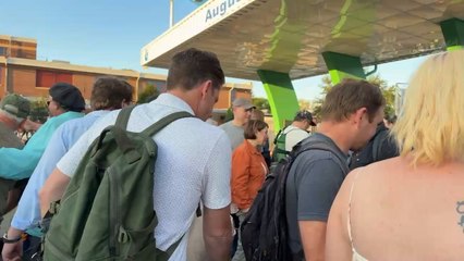 Gov. Tim Walz greets visitors outside Minnesota State Fair