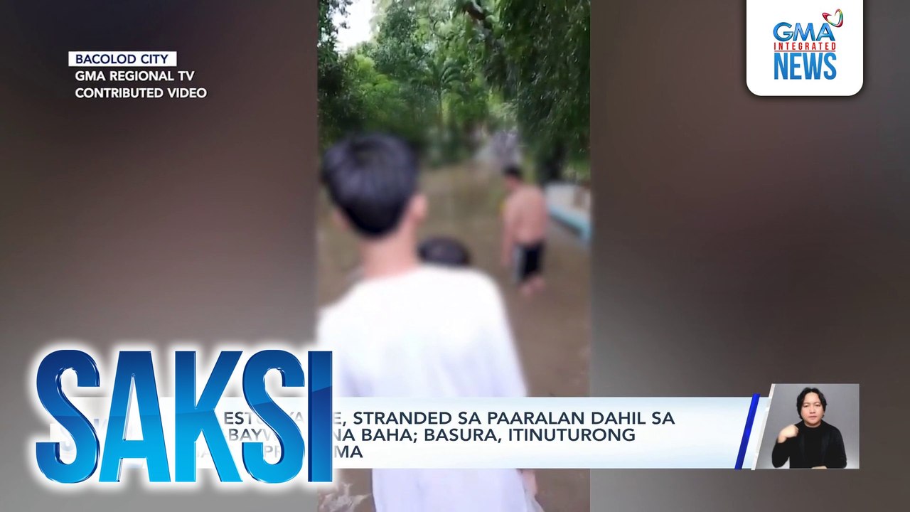 Mga estudyante, stranded sa paaralan dahil sa abot-baywang na baha; basura, itinuturong ugat ng problema | Saksi