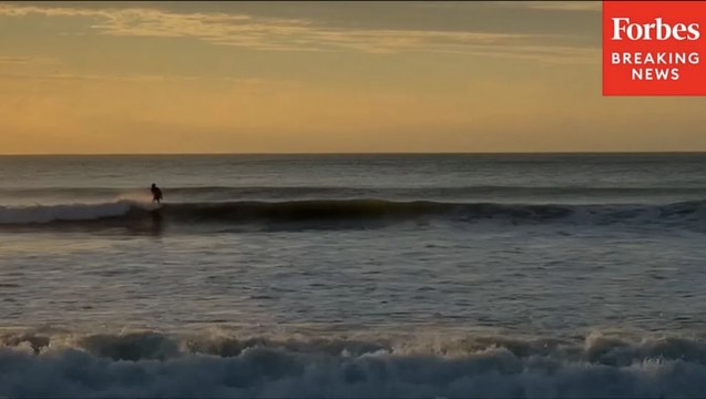 Surfers Surf Hurricane Erin's Waves As They Touch Down In Wrightsville Beach, North Carolina