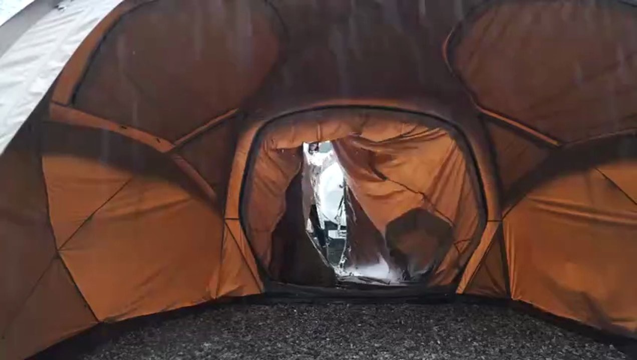1000104588CAMPING IN THE RAIN WITH A NEW CAR TENT
