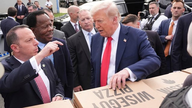 Trump hands out pizzas to National Guard troops as he claims DC now ‘a different city’