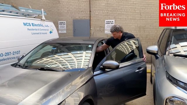 FBI Agent Leaving The Office Of John Bolton Ignores Question From Reporter