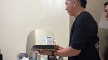 Impatient friends hit the birthday honoree's head with a box of cake