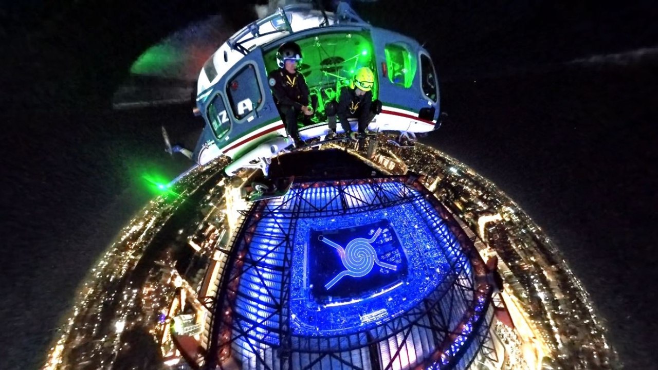 La cerimonia di apertura dei Giochi Milano-Cortina vista dall'alto: il volo con l'elicottero della Polizia di Stato sopra San Siro