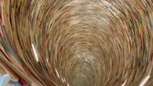 'Infinite' Tower of Books - Experience what it feels like to drown in a book well