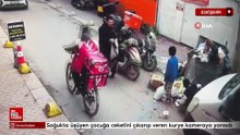 Eskişehir'de soğukta üşüyen çocuğa ceketini çıkarıp veren kurye kameraya yansıdı
