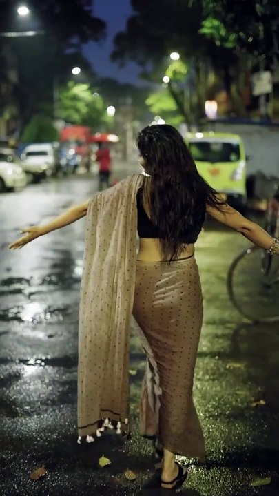 Hot Desi Girl in Black Saree enjoying Rain and Hot Tea