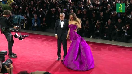 George Clooney y Emma Stone brillan en una Mostra de Venecia pasada por agua