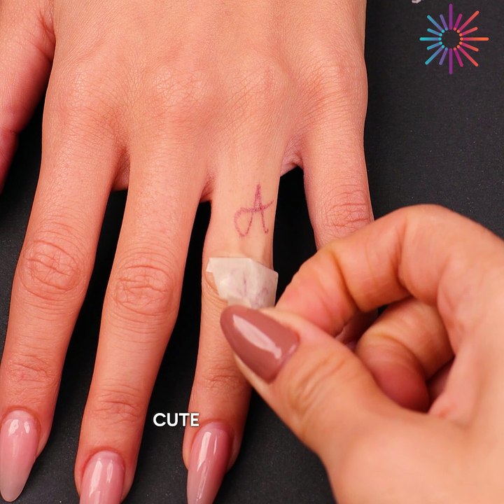 Tiny and elegant initial tattoos