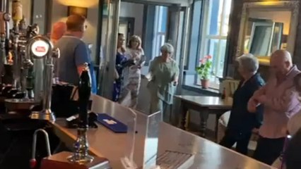 Woman walks into 70th birthday party and reacts like the queen of the room