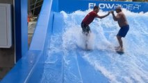 FlowRider surf goes wrong: Dad falls and takes a staff  member down with him
