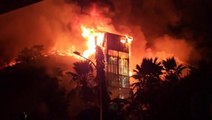 Protests rage in Indonesia as mob sets fire to regional parliament building