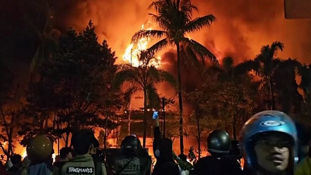 Several dead as Indonesian protesters set fire to government building