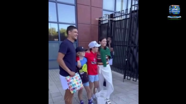 CAPPY ENDING: A young US Open tennis fan is reunited with the player whose cap was SNATCHED away from him by a selfish man in the crowd