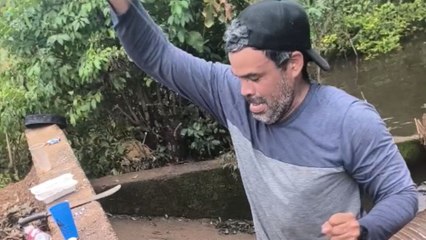 Fisherman’s catch slips away and flops around in desperate bid to return to the water