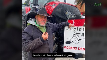 Farmer with wind turbines protests for 'farmers right to choose'
