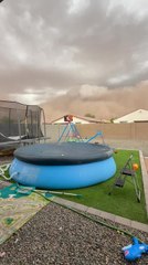 Woman Closes Pool as Massive Dust Storm Approaches Casa Grande, Arizona