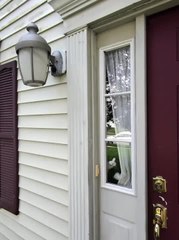 Cat Peeks Through Window When Bell Rings