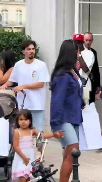 PSG players Vitinha and Nuno Mendes enjoy a family outing and go shopping in Paris