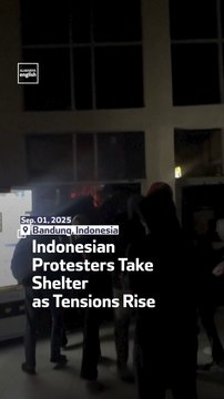 Indonesian Protesters Take Shelter As Tensions Rise