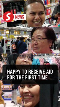 Shoppers willing to endure long queues to spend RM100 Sara aid