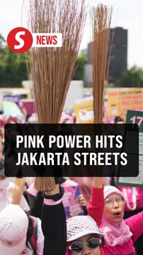 Indonesian women deck out in pink to call for reform at Jakarta protests