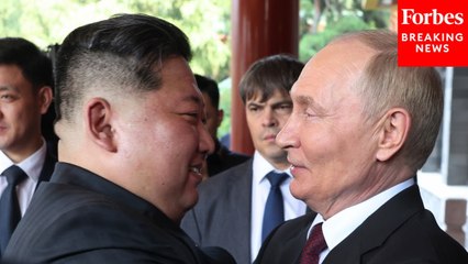 Vladimir Putin And Kim Jong Un Hug During Visit To China