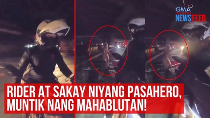 Rider at sakay niyang pasahero, muntik nang mahablutan! | GMA Integrated Newsfeed