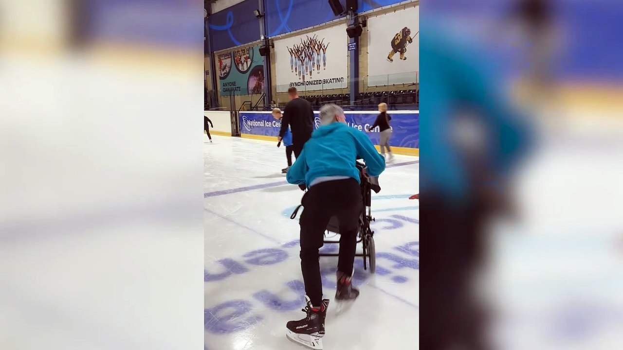 Boy with cerebral palsy lights up as stranger takes him for a spin on the ice