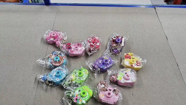 Unboxing and Review of Cute Mini Camera Projector Keychain Toy – Kids Party Favor Return Gift – Portable Miniature Projector with Light