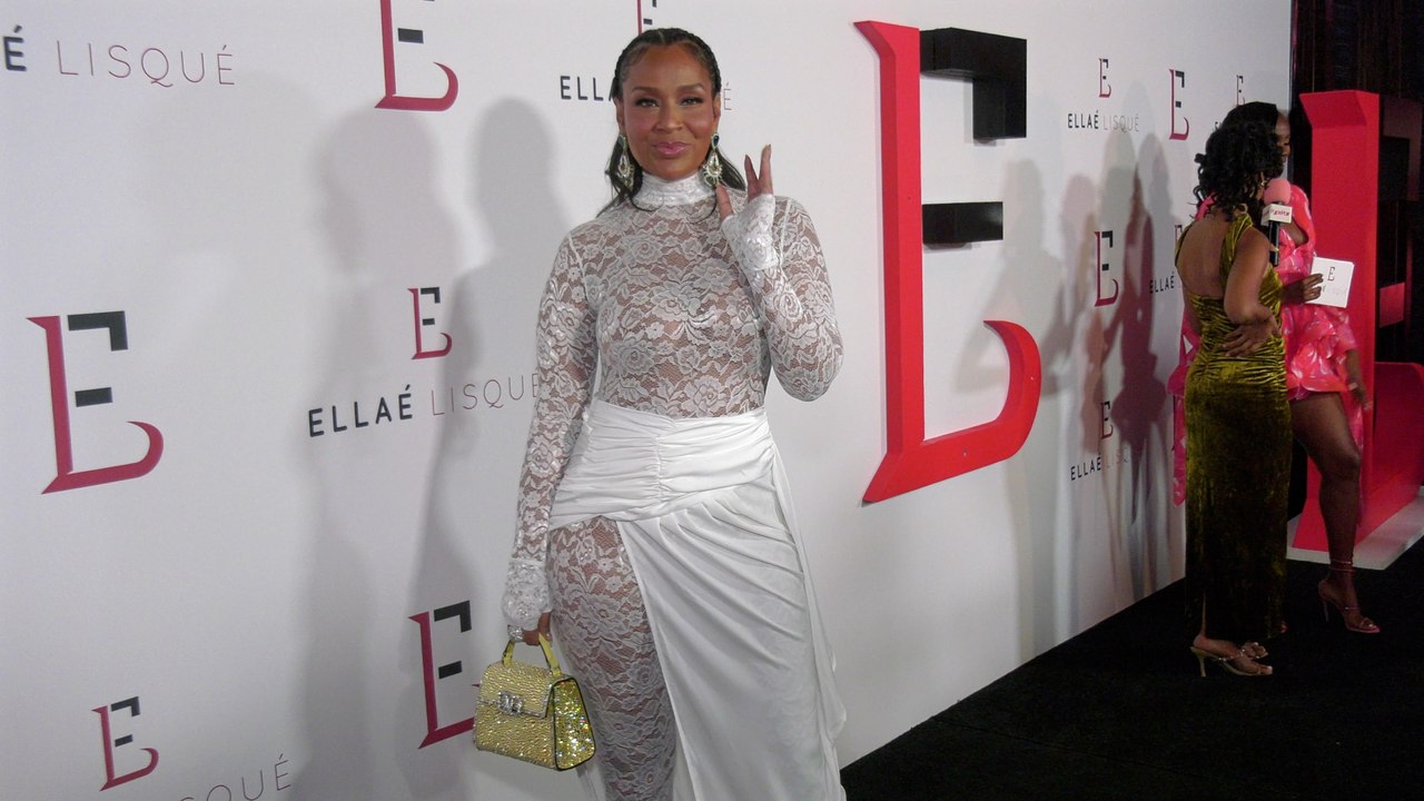 LisaRaye McCoy attends "Ellaé Lisqué's 10th Anniversary Show" red carpet